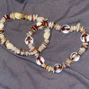 White shell bracelet with tigers eye marbles
